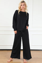 Koisoon Full Size Textured Long Sleeve Top and Drawstring Pants Set